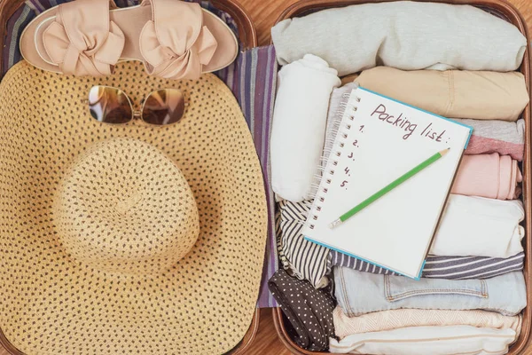 Packing list or travel planner. Preparing for vacation, journey