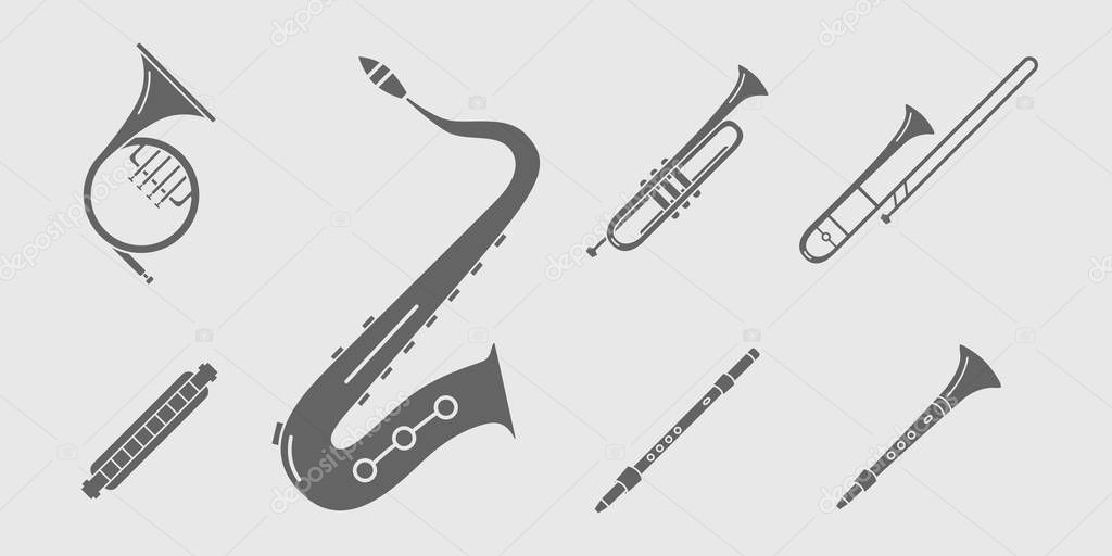 Music instruments Icons set - Vector solid silhouettes of wind instruments, saxophone, sax, tube, mouth organ and flute for the site or interface