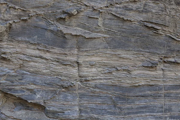 天然石の質感 岩盤表面の自然な質感で 長い時間の間に描かれた線を見ることができます 背景として使用できます — ストック写真