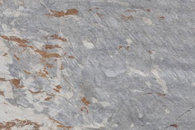 Soyut desenli doğal kaya dokusuna sahip arka plan. Basit kaya deseni. Yazma alanı olarak kullanmak için idealdir. Arka plan olarak kullanılabilir.