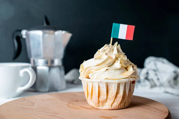 Freshly Baked Almond Cream Cupcake and Almond Crumb with Italian flag for Morning Tea Party