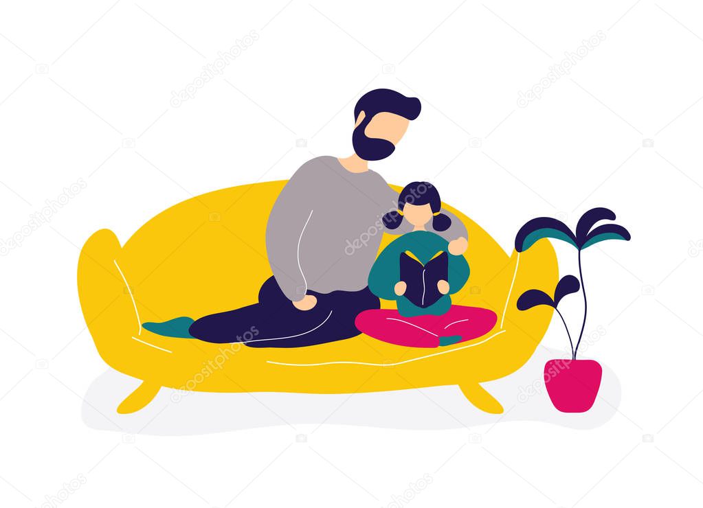 Father reading book with daughter on sofa