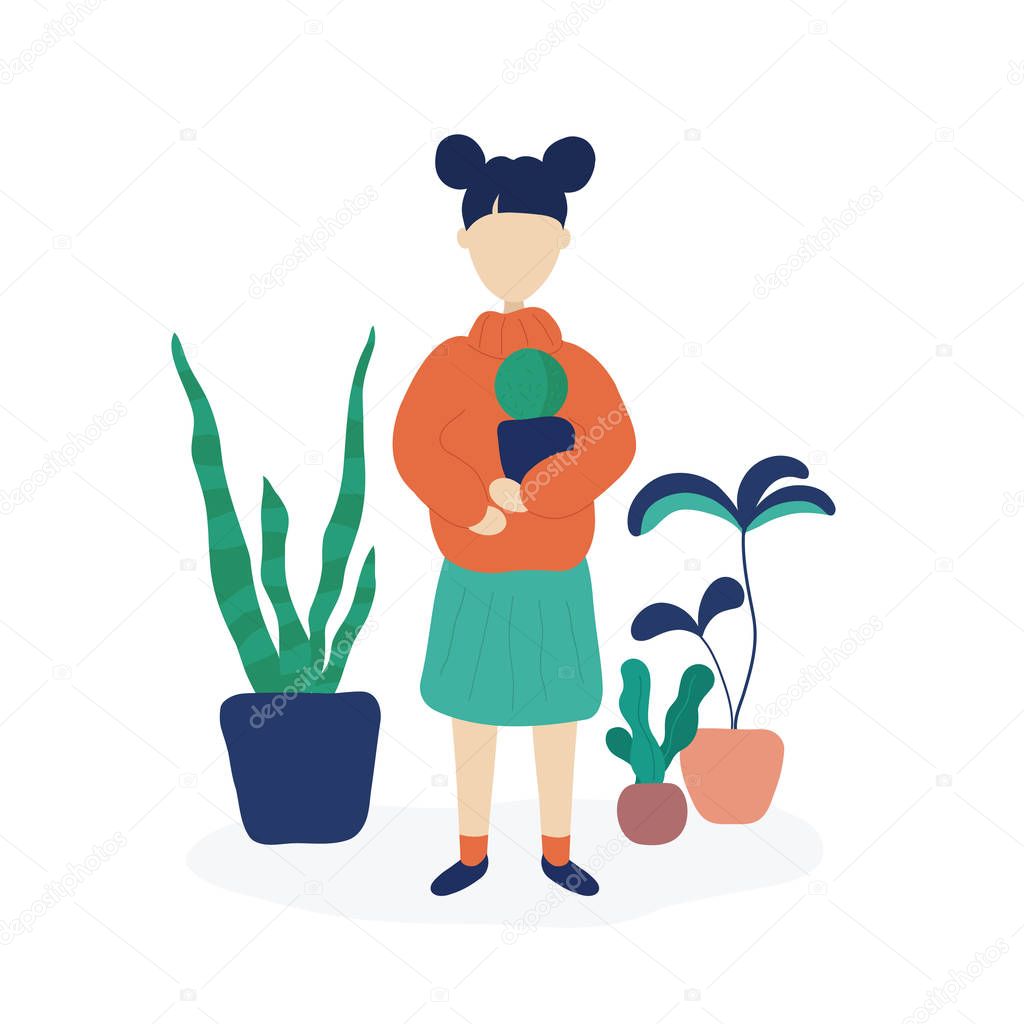 Girl holding cactus surrounded by home plants