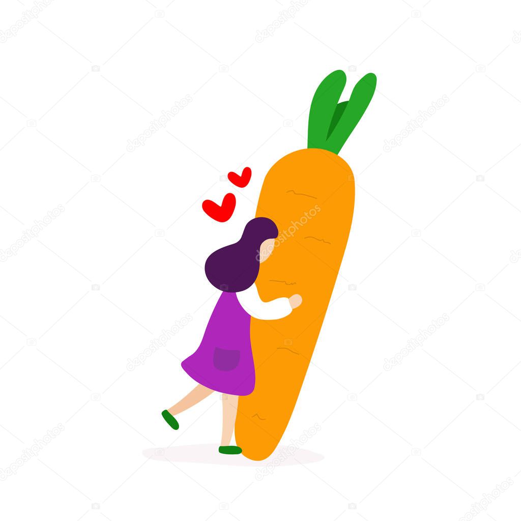Young girl hugging with big carrot