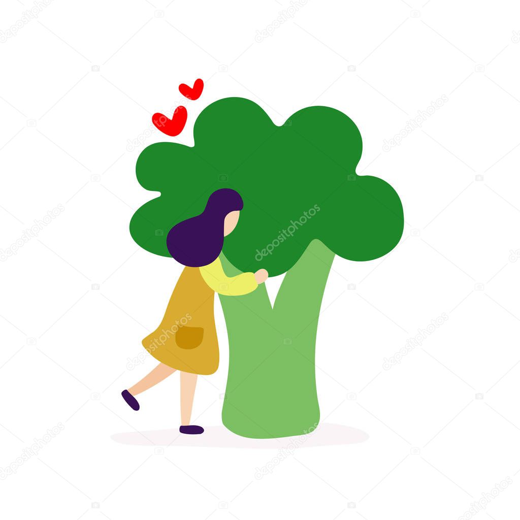 Young girl hugging big broccoli