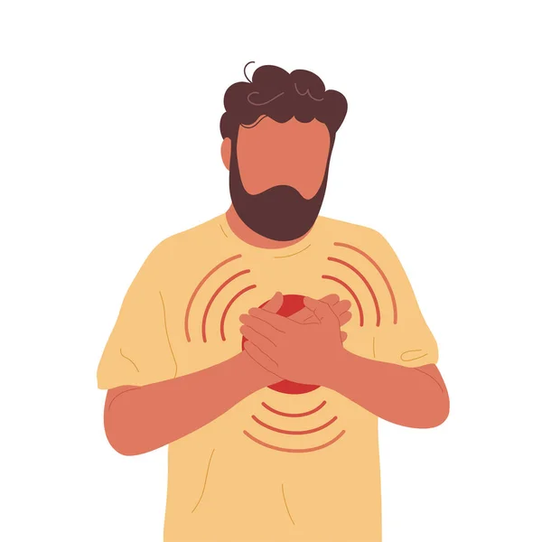 Göğsüne dokunan kalp ağrısı olan genç bir adam.
