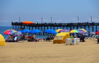 Virginia Beach, U.S.A - July 1, 2020 - Crowds on the beach during a hot summer day clipart