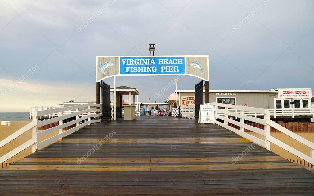 Virginia Beach, U.S.A - June 29, 2020 - The entrance into the fishing pier during a rainy summer day