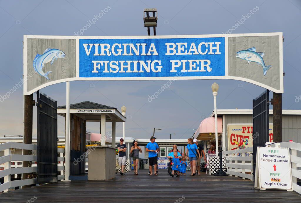 Virginia Beach, U.S.A - June 29, 2020 - The entrance into the fishing pier during a rainy summer day