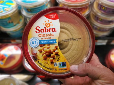Wilmington, Delaware, U.S.A - Sept 16, 2025 - Sabra Classic Hummus, America's No 1 hummus brand, available in a family-size 17 oz container.