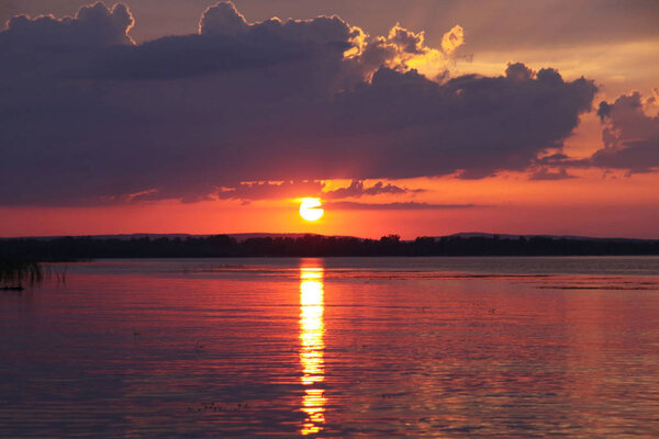 fantastic picturesque sunset. road of sun on the water