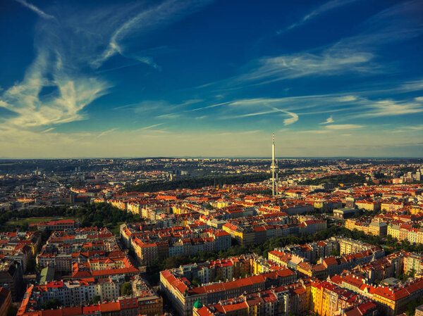 Aerial view of zizkov tv tower in prague under bright sky and clouds sunny day