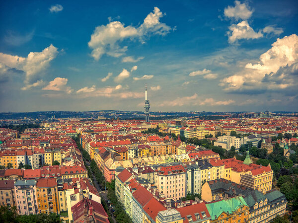 Aerial view of TV tower in Prague Zizkov under hot summer and clouds