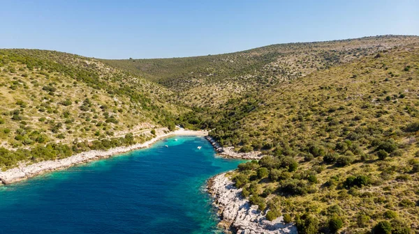 Spectacular aerial sea landscape of rocky coast and crystal clear water.