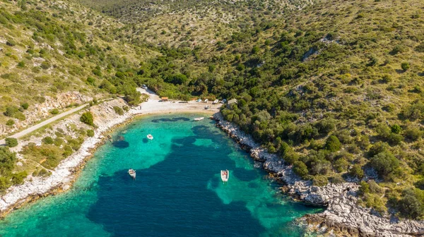 Spectacular aerial sea landscape of rocky coast and crystal clear water.