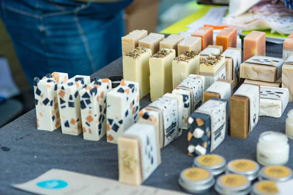 Various hand made soups on display at outdoor market place. — Stock Photo, Image