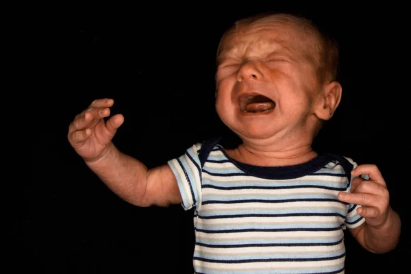 Bebé Hayden en negro - Tres semanas de edad Imágenes de stock libres de derechos