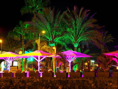 Promenade at the Playa de las Americas on tenerife at night. clipart