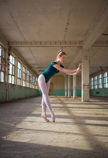 Young, elegant, graceful woman ballet dancer. Toe walking, technique