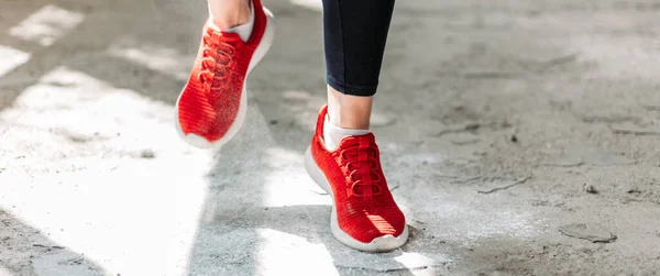 Close Red Pair Female Fitness Sneakers Jumping Wide Banner Format — Stock Photo, Image