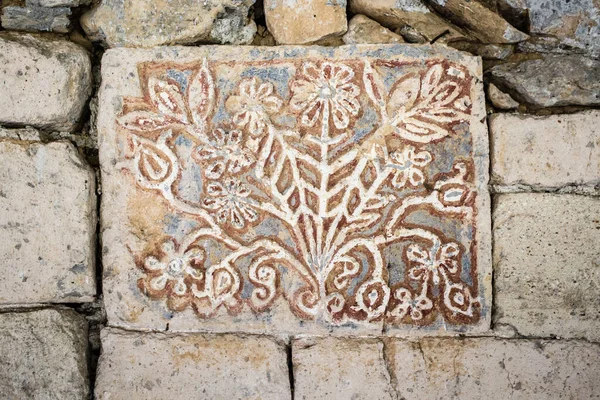 Decorative, floral ornament on the wall. Background, pattern