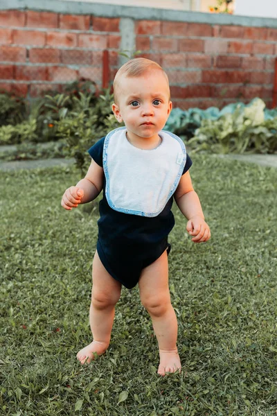 Adorable One Year Old Boy Stands Grass Barefoot Keeping His — Stock Photo, Image