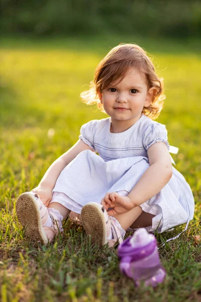 Cute Little Two Year Old Girl White Dress Sits Grass — Stock Photo, Image