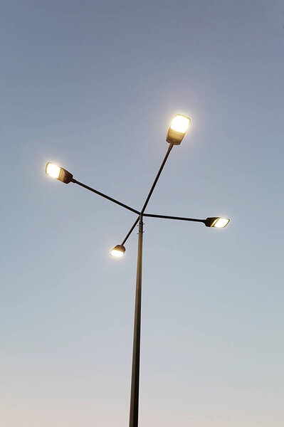 Street lamp on blue sky background