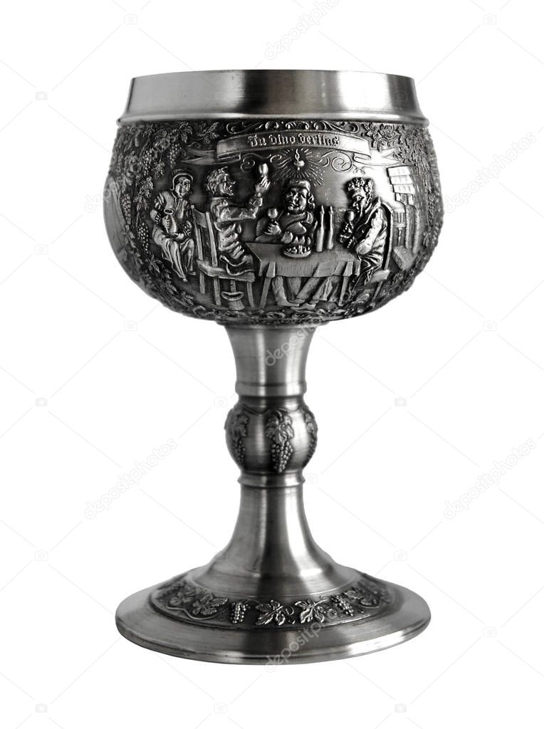 Silver or pewter wine goblet bas-relief and Latin inscription - In Vino Veritas. Photo with a