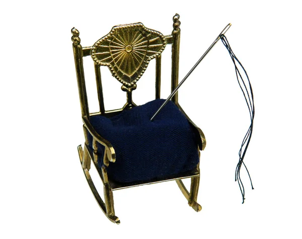 Antique pin cushion as a chair — Stock Photo, Image