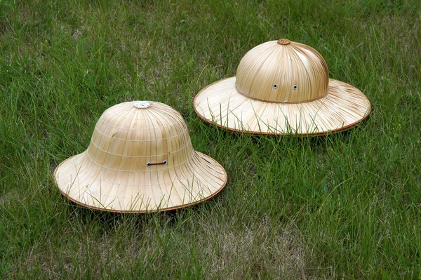 Two handmade straw hats