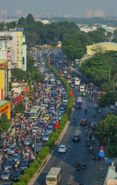 Saigon, Vietnam - 1 Şubat 2019. Acele saat ana cadde üzerinde. Ho Chi Minh City (Saigon), acele saat trafik 7 milyon motosiklet şehrin içinden sıkıştırma tarafından bileşik olduğunu.