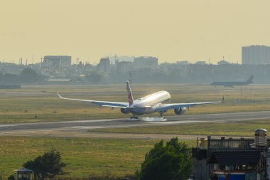 Saigon, Vietnam - 8 Şubat 2019. Tan Son Nhat Havaalanı (Sgn açılış Airbus A350-900 uçak Çin Havayolları (karbon fiber Airbus üniforma)).