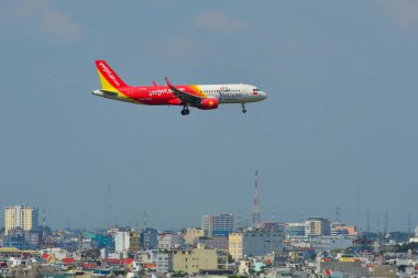 Saigon, Vietnam - 20 Kasım 2018. Vietjet Tan oğlu Nhat Havalimanı (Sgn) Saigon (Ho Chi Minh City'nda açılış hava bir Airbus A320 uçağı).