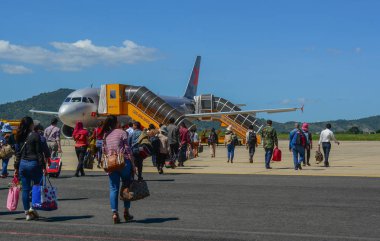 Önlük alan, Bagaj ile seyahat etmek