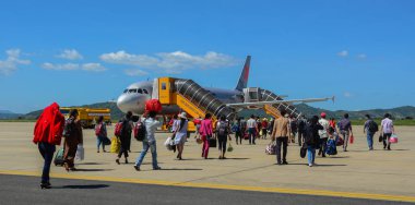 Önlük alan, Bagaj ile seyahat etmek