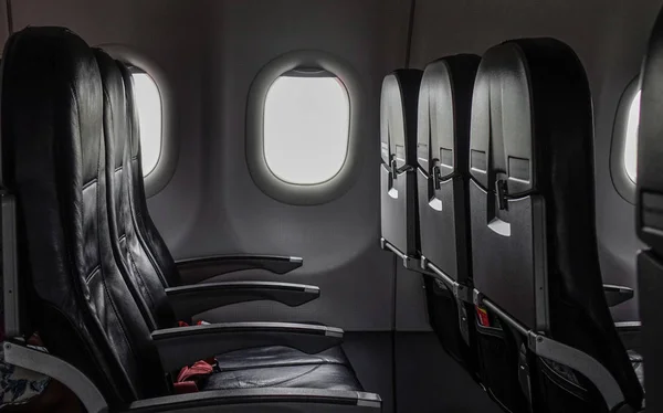 Empty airplane with chairs — Stock Photo, Image