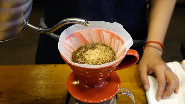 Brewing coffee at a specialty coffee shop