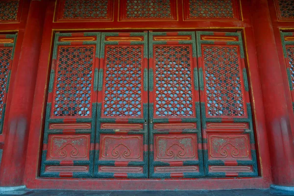 Ornate red wooden door — Stock Photo, Image