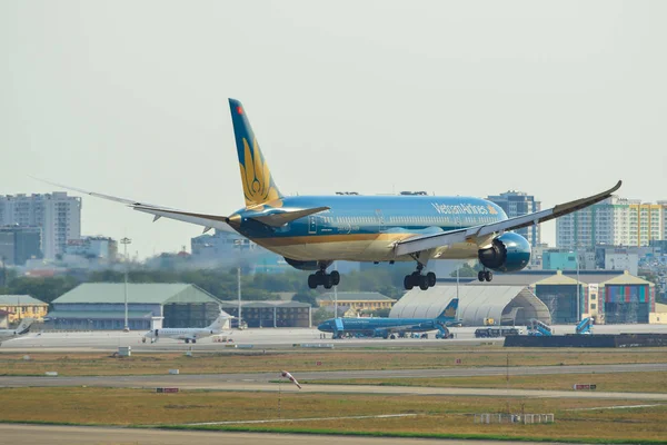 Passenger airplane landing at the airport — Stock Photo, Image