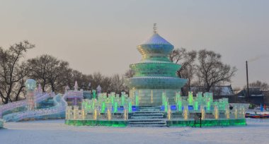 Harbin, China - Feb 25, 2018. Ice and Snow Sculpture during Winter Holiday at the park in Harbin, China. clipart