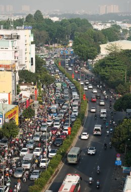Saigon, Vietnam - 1 Şubat 2019. Acele saat ana cadde üzerinde. Ho Chi Minh City (Saigon), acele saat trafik 7 milyon motosiklet şehrin içinden sıkıştırma tarafından bileşik olduğunu.