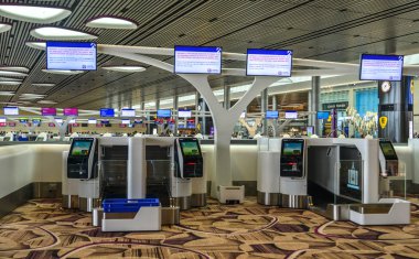 Singapur - Mar 28, 2019. Changi Havaalanı Terminal 4'teki Self Servis Check-in Kioskları (Sin). Terminal 4 resmen Ekim 2017'de açıldı.