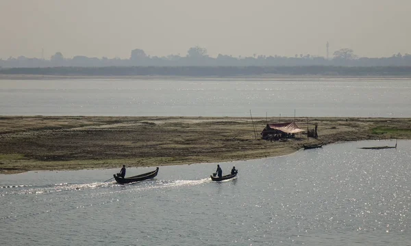 Wooden boats running on river — 스톡 사진