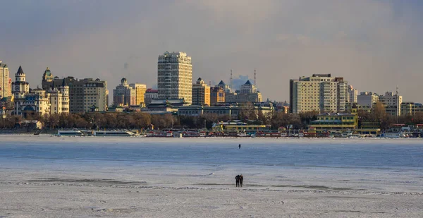 Harbin cityscape with ice river — Stock Photo, Image