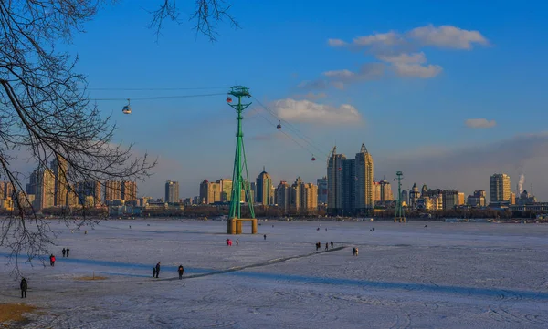 Harbin cityscape with ice river — Stock Photo, Image