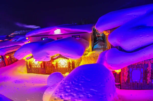 Pueblo de nieve por la noche en Harbin, China —  Fotos de Stock
