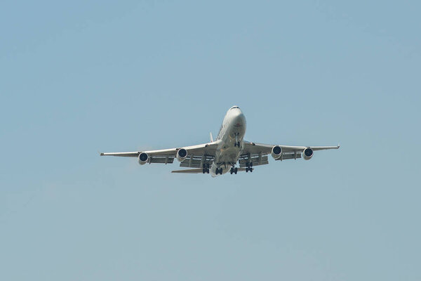 Airplane landing at the airport 