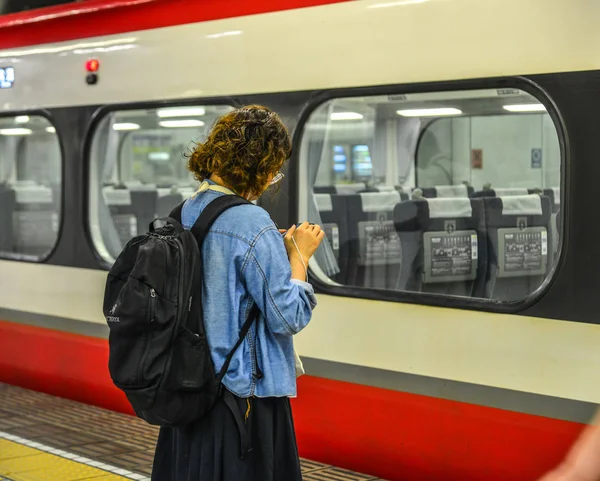 Passengers waiting for the train at JR Station — Stock Photo, Image