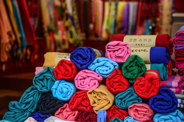 Colorful textile for sale at a street market — Stock Photo, Image